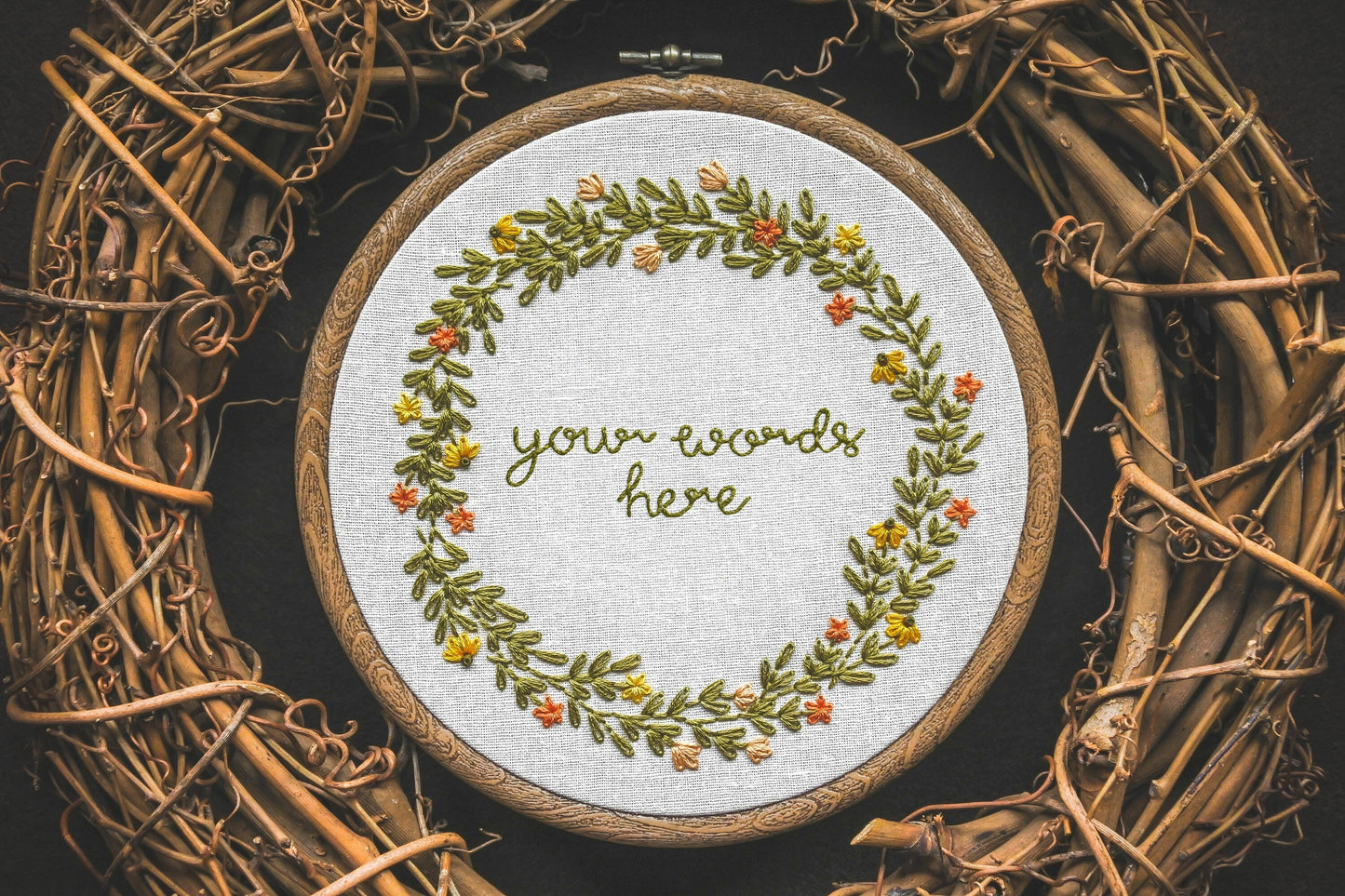 Customisable wreath design with the text "your words here" in the centre.