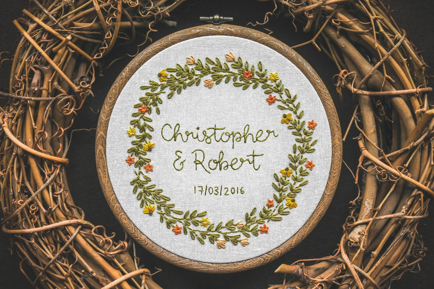Custom summer wreath design with the names "Christopher and Robert" and the date "17/03/2016" embroidered in the centre.